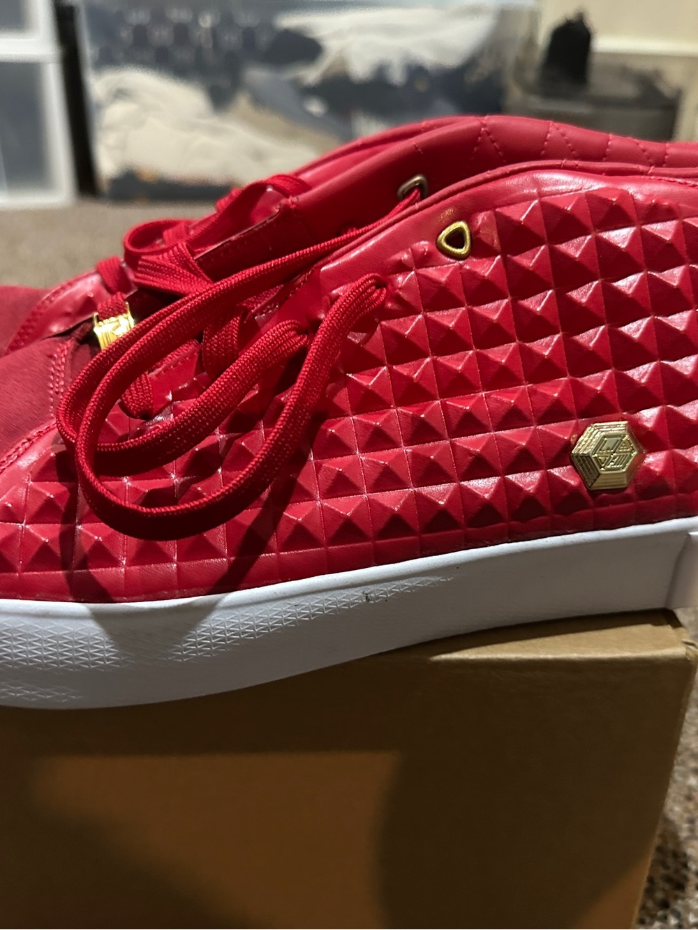 Quilted Red Low-Top Sneaker with Gold Accents